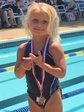 kendall showing swimming medal