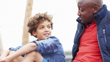 Family talking to youth