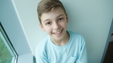 Allergy patient in hospital smiling