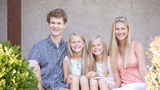 Four celiac and gluten sensitive patients sitting together smiling