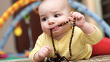 Risks to Young Children from Swallowed Objects baby with beads