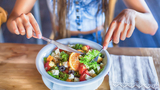 Healthy Vegetarian Diets for Teens young woman eating salad