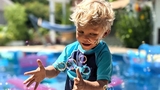 Rory playing with the bubbles