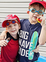 Luke and his brother in the summer