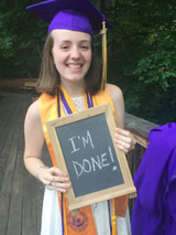 Ashley wearing a graduation cap