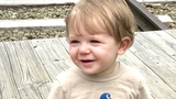 Austin sitting outside
