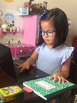 Avery attending online class