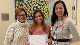 Devon with her mom and caregiver at CHOP