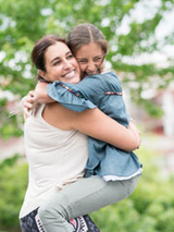 Paulina hugging her mom