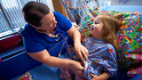 Cardiac Nurse with Patient