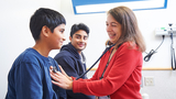 Doctor with 2 patients