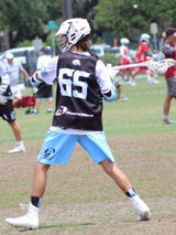 Adison playing lacrosse