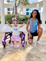 young patient with SMA and her mom outside of hospital