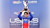 Jacob holding is pro kart trophy