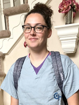Madison in her hospital scrubs