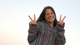 Josephine making the peace sign