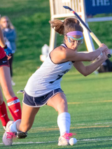 Josephine playing field hockey