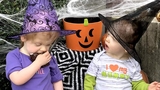 Delaney twins dressed as witches for Halloween