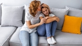 Mom consoling child