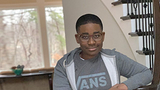 Akil smiling
