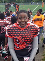 Akil in his football uniform