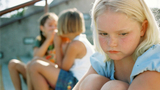 little girl frowning
