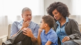 Parents talking with their child