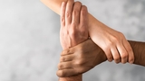 Hands of different races held together Hands of different races held together