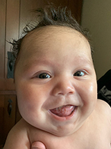 Dom smiling