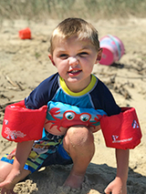 Hudson playing in the sand