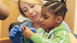 Healthcare Professional and Child Image