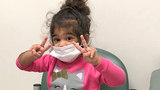 Leilani wearing a protective mask