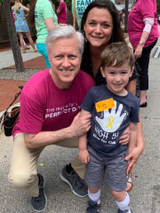 patient and doctor outside smiling