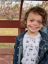 Killian smiling outside