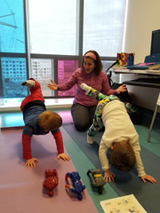 Lucas doing yoga at CHOP