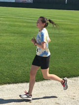 Brenna running outside