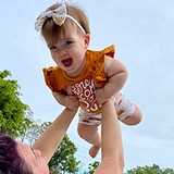 Lyra being thrown in the air