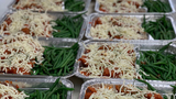 food in metal trays food in metal trays