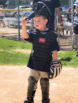 Cardiac patient in catcher uniform at baseball game