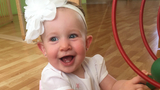 Milana smiling and playing at home after CDH repair