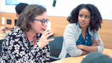 Two women talking