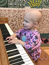 Nicholas playing piano