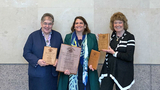 Group holding Special Service awards