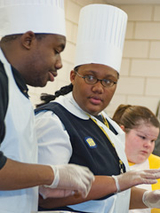 Girl wearing chef's hat