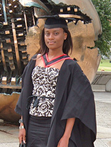 Tiny in her graduation gown