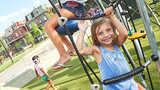 Girl playing on playground Girl playing on playground