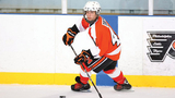 nicholas playing hockey