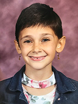 Izzy smiling
