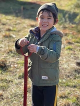 Brachial Plexus Injury: Cai Li’s Story - Cai Li on scooter