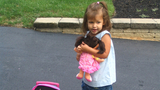 addie holding her doll